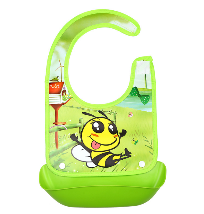 Toddler using silicone bib - deep pocket bib keeps clothes clean during feeding